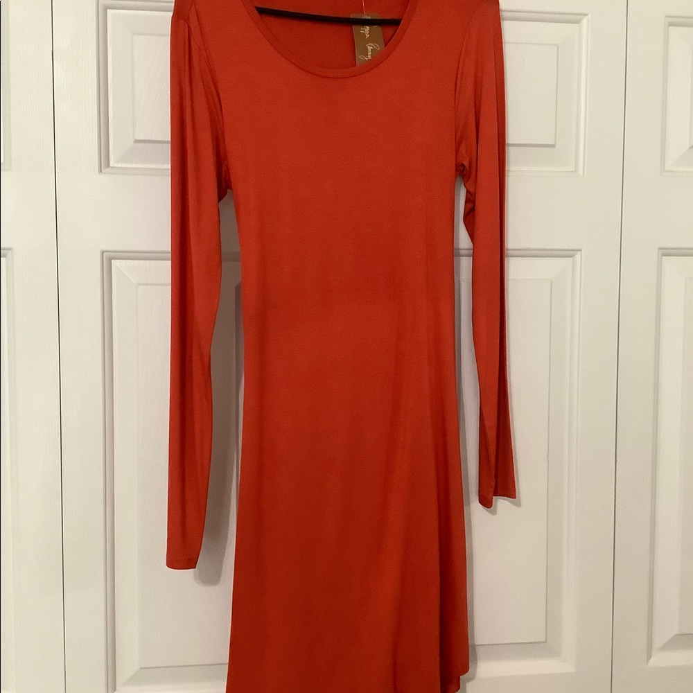 NWT- Sexy orange dress with low cut back.